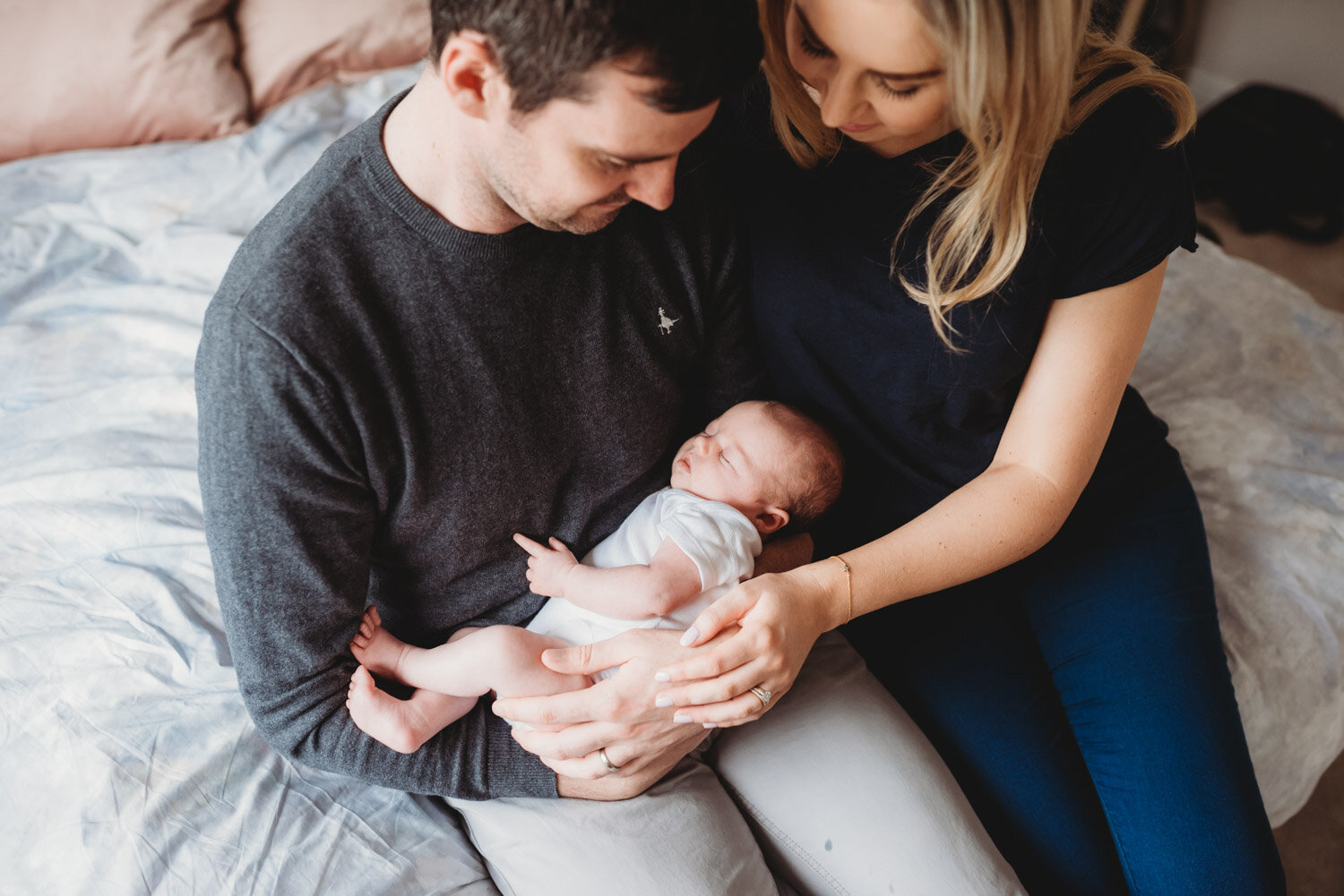 Lorraine Maguire Photography family cuddles with new baby