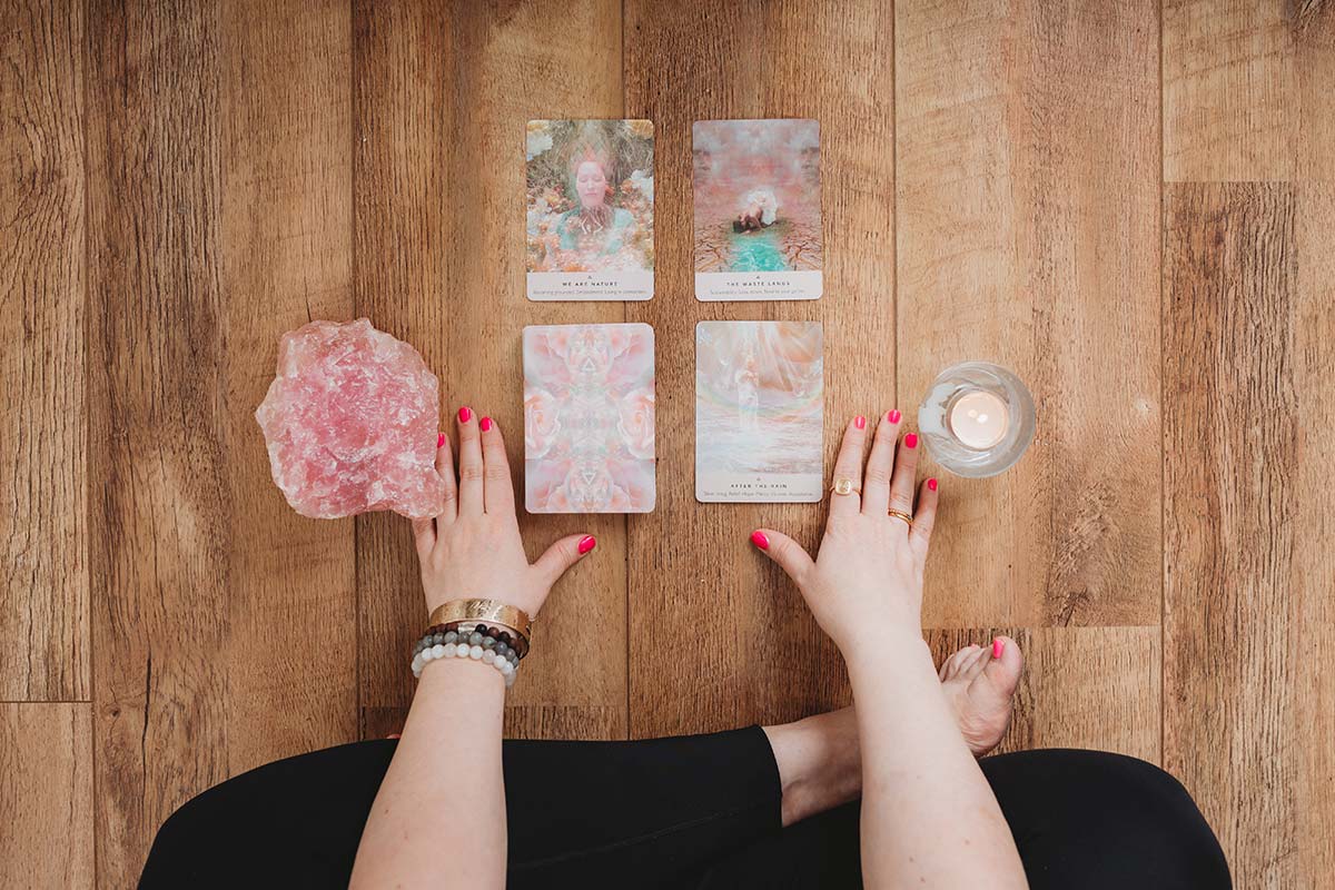 pink angel cards on wooden floorboards